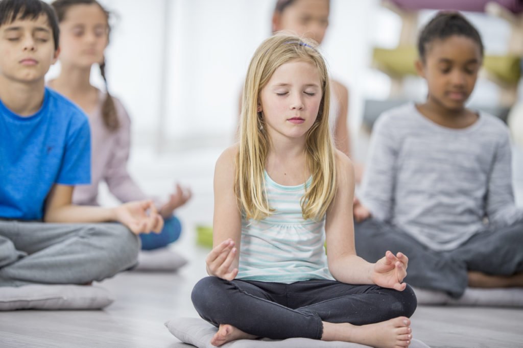 Young People Meditating
